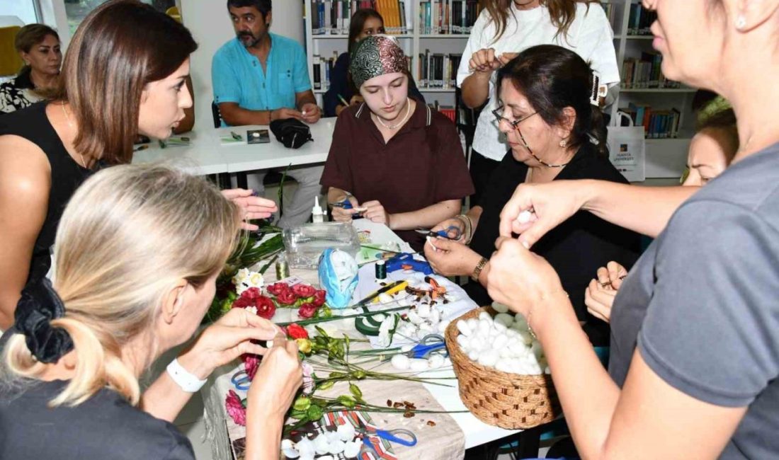 Alanya Üniversitesi’nde düzenlenen atölye çalışmasında katılımcılar, ipek kozasından çiçek yapımını