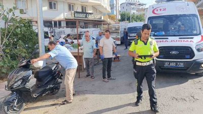 Manavgat’ta ara sokaktan çıkan bisikletli çocuğa çarpmamak için motosikletini deviren